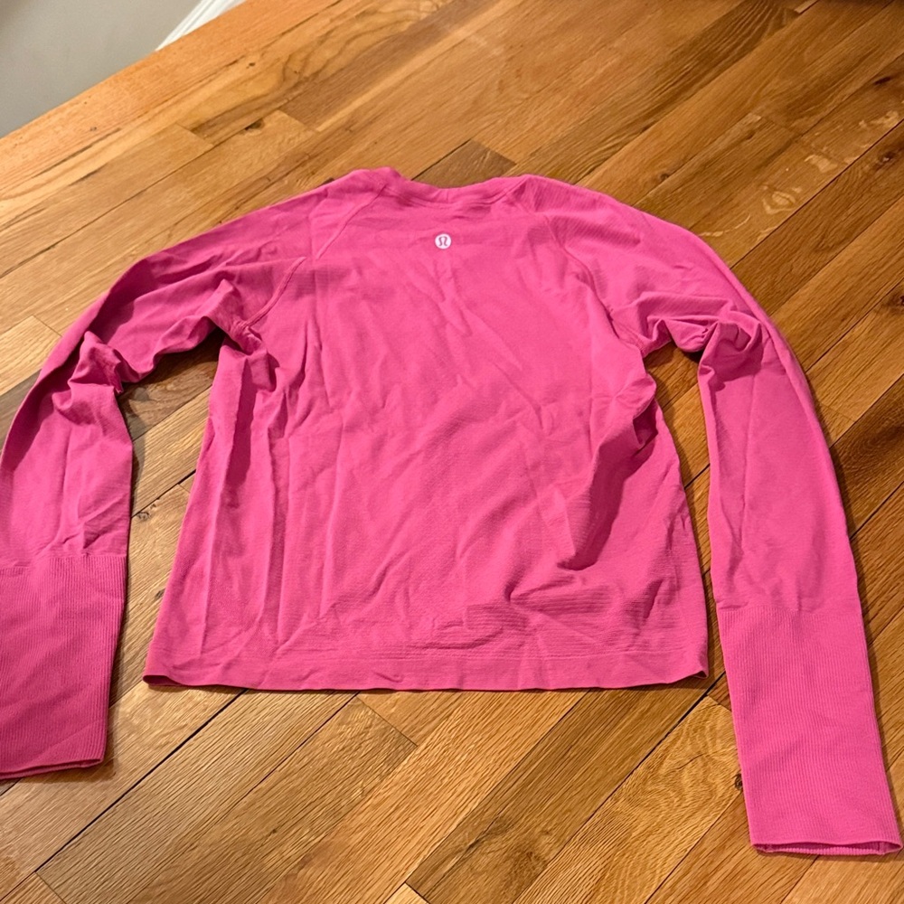 Lululemon Athletica Sonic Pink Long Sleeve Top, 2.0 waist length.
